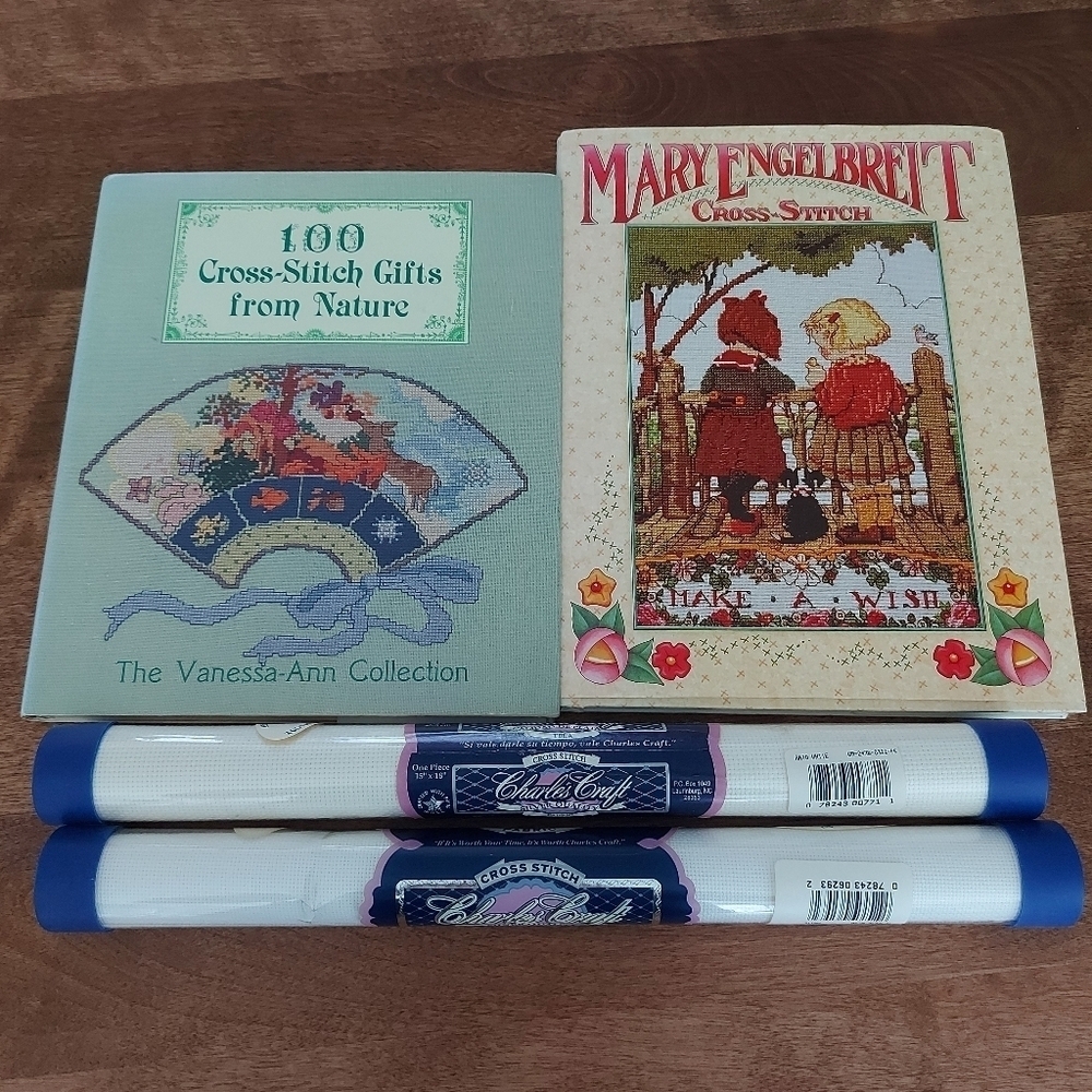 Cross stitch pattern books plus Cross stitch fabric